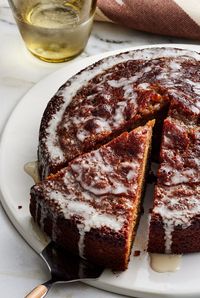 During Rosh Hashanah celebrations, honey cake commonly shows up on dessert tables because honey symbolizes the hope of a sweet new year. This super moist, delicious honey cake will thrill everyone at your dinner. Get the recipe at the link! #southernliving #dessertrecipes #roshhashanah #roshhashanahrecipes