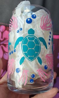 This Beautiful Blue Turtles and Seashells and Pink Seaweed is crazy cute. This is a cup for Sea Turtle and Beach Lovers a must have. Great for Teachers gifts 2 Sizes available 16 oz or 20 oz can add bamboo lid if you would like. If you would like customized, please let me know! I would love to❤️ If you would like something left off, please let me know would ❤️too! These make the coolest gifts for any occasions! These are made with quality permanent vinyl. Must be gently handle.  Will last a long