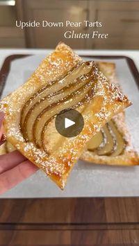 22K views · 429 reactions | Upside Down Pear Tarts

This may be the easiest dessert ever! Ready in 15 minutes! #recipe ⬇️
Ingredients
1 pear, core removed, sliced thin
1 sheet puff pastry
3 tbsp honey
Topping powdered sugar

Preheat the oven to 425 degrees. Line a baking sheet with parchment
paper. Slice the pastry sheet into 4 equal sizes. On the parchment
paper drizzle the honey onto 4 pieces-leaving enough room between to
add the puff pastry. Add 3 slices of pears on top of each honey piece.
Top with puff pastry, press the edges down into the paper slightly.
Bake for 15-18 minutes. Should be golden brown. Remove and using a
spatula flip over. Dust the top with powdered sugar and enjoy!

#peartart #pears #puffpastry #pastrylove #easyrecipes #desserttable #bakingathome | Easy & yummy reci