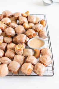 Soft Earl Grey infused brioche is cut into squares and fried until golden, then drenched in earl grey glaze.