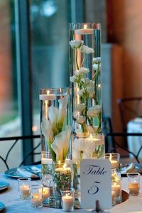 20 Floating Candle Flower Wedding Centerpiece Ideas | R&R