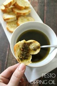 Pesto Dipping Oil is the best version of all those restaurant bread companions your get! Pesto, olive oil & balsamic marry together for a dip you'll love!