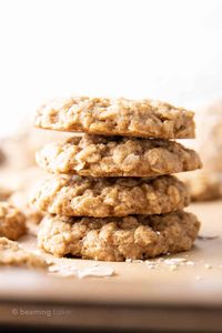 Lightly sweet healthy oatmeal cookies bursting with warm, cozy spices and buttery-rich flavor. You’d never know these oatmeal cookies were healthy! | Recipe at BeamingBaker.com