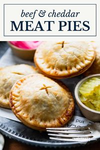 These easy meat pies include tender, buttery, flaky pastry dough wrapped around a flavorful ground beef, cheddar, and caramelized onion filling. Thanks to a couple of shortcuts, the convenient savory hand pies come together quickly and can be assembled in advance for busy weeknights!