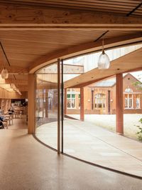 The curved glass windows at Lea Bridge Library were created by IQ Glass as part of the glass facade design. The glass facade uses frameless structural glass to create the minimal design with curved glass windows integrated at key points. Click the image to read the full case study from IQ Glass.