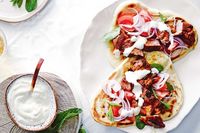 Indian-inspired spiced lamb on flatbread signals laidback summer entertaining. Ditch the utensils and let guests assemble their own at the table.