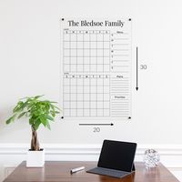 The 2 month acrylic calendar for wall is the perfect addition to any home, office or mudroom. Personalized it with any family name, couples names, quote or phrase. We offer 10 font options for the main title. Sleek and modern design to go with any decor. It's an eye catching statement piece. The clear acrylic has an amazing writing surface that wipes clean every time with our markers. Leaving no ghosting effect.  What's Included: Personalized clear acrylic calendar with polished edges. High qual