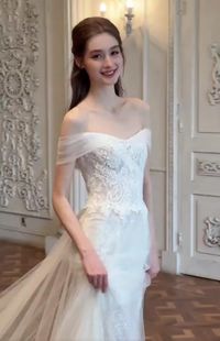 Off the shoulder lace tulle wedding dress for fairy and whimsical weddings! #weddingdress #customdress #bridetobe #courhouseweddingdress #weddingreceptiondress #civilweddingdress #elopementdress