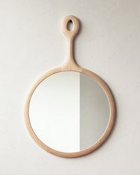 The Sophia Mirror provides a polished look to your space with its generous round frame and long elegant neck. The Large size is ideal for a powder room above a single sink or hanging above a console in an entryway. The Medium size looks lovely above a dresser or in a hallway. A decorative iron peg and metal drywall anchor are included. Handcrafted in Pennsylvania. Available in beautiful maple or rich black walnut.