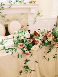 Fine art wedding reception ideas for an elegant fall wedding at Cecil Green Park House, a Vancouver wedding venue. Head table ideas with overflowing organic florals. Planning and design by Wonderstruck Events, destination wedding planner in Paris. #fineartweddings #fineartbride