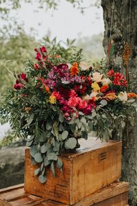 Camp wedding, wild flowers, colors, rustic, arrows ceremony florals