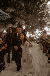 Lily and Aidan knew the possibility of snow on their NYE wedding was likely... but this winter wonderland wedding really blew it out of the water. The amount of snow during this snowy wedding was insane! A snowy wedding ceremony, snowy bridesmaid pictures, winter wedding photos in the snow... we were drenched! I loved every minute. See more from this cute and cozy winter wedding on my blog!