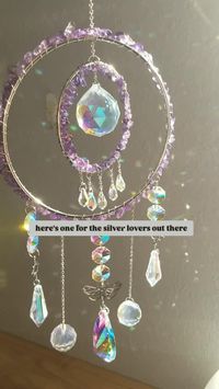 Here's one for the silver lovers out there!! This whimsical suncatcher is wire wrapped with Amethyst crystal beads. It has gorgeous silver charms and lots of glass crystal prisms that will create beautiful rainbows in the sunlight!🌈🌈 It's a unique way to add to your crystal collection without needing more shelf space🤣🤣 iykyk am I right?? 😉 . . #suncatcher #suncatchershop #whimsicaldecor #crystals #handmade #fyp #amethyst #witchyvibes #witchydecor #cottagecore #fairycore #faecore #faefolk #f...