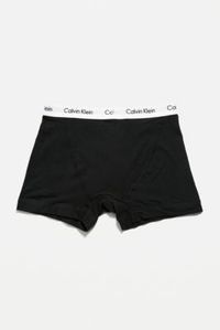 Staple set of stretchy boxer trunks by Calvin Klein feature a body-defining fit. Constructed from breathable cotton with a signature logo taped waistband. **Content + Care** \- Includes 3 pairs \- 95% Cotton, 5% Elastane \- Machine wash | Calvin Klein Black & White Boxer Trunks 3-Pack - Black S at Urban Outfitters