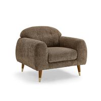 With its Sherpa upholstery, button tufting, and retro silhouette, this armchair features mid-century modern style elements for a timeless look. Crisp white upholstery and natural wood legs brighten any space while also complementing any color scheme. Four solid wood legs with brass caps make this armchair sturdy and durable. Add this chair to a bedroom, open-concept living space, or playroom to create a stylish yet appealing reading nook. Fabric: Camel Boucle | Armchair - Everly Quinn Elishah Mi