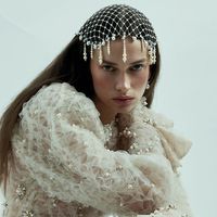 SAIID KOBEISY on Instagram: "Pearls, the epitome of elegance. Saiid Kobeisy headlines the cover story of Harper’s Bazaar Arabia. @harpersbazaararabia Styled by: @laura.jane.brown Photographer: @shootmeamer Headpiece: @zaidfarouki"