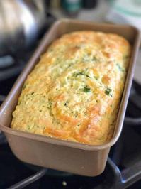 This Savory Zucchini Quick Bread requires no yeast or rise time or buttermilk! It is our favorite quick bread recipe! #quickbread #zucchinirecipes #savoryquickbread #easybread #cheddarquickbread