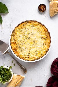 Potato Egg Casserole is an easy, elegant frittata-like dish to serve at breakfast or brunch. Layers of gruyere cheese, herbs, garlic, and shallot burst with flavor in this vegetarian egg bake. Top with arugula for added texture, color, and bright, peppery freshness.