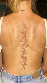 Floral spine tattoo small, flower spine tattoo, Floral spine tattoo female, birth flower spine tattoo, Floral spine tattoo meaning, simple flower spine tattoo, Floral spine tattoo ideas, delicate flower spine tattoo