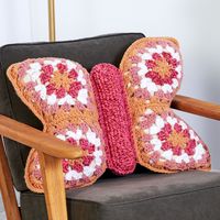 Free Easy Crochet Pillow/Pouf Pattern For HomeAdd a touch of whimsy to your world with this lighthearted crochet pillow that is fun and fast to make. Featured in soft and fluffy Bernat Forever Fleece, your favorite granny squares inspire the colorful wings! Practice double crochet, single crochet, and granny square-type clusters. Make a pair in different colors to add a flutter of beauty to your world.Material NotesDon’t forget to pick up the finishing touches for your project! Take a look at the list of supplies you’ll need that aren’t included in your kit.Kit does not include: Polyfill stuffing. ½ yard [.5 m] of 45” [115 cm] wide white fabric to use behind Wing Motifs to enclose stuffing.