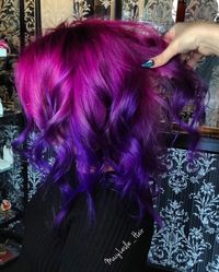 Vivid color melt, pink hair, purple hair, funky colors, bright color hair, curls, messy curls.