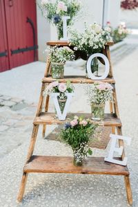 What a cute wedding decor! Rustic elements and fresh florals lend a very romantic and quaint charm that no one will get enough of!  Image courtesy: Pinterest  #tabledecor #decor #decorideas #weddingdecor #decorinspiration #inspiration #weddings #indianweddings #bigfatindianwedding #sangeet #weddingday #mehendi #eventplanners #weddingplanners #eventmanagement #SamaniDecorators #weddingdecorations #weddingsutra #wedmegood #pinterest