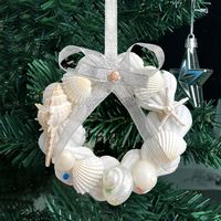 PRICES MAY VARY. Natural Shell Christmas Ornaments: Elevate your Christmas tree with our exquisite handmade ornaments crafted from natural shells. These unique shell crafts will add a touch of elegance and create a distinctive Christmas atmosphere. Easy to Use: Each seashell Christmas tree ornament comes with a ribbon for easy hanging. No tools or complicated installation required. Simply hang them wherever you desire to add a charming coastal touch to your Christmas decorations. Creative Handma