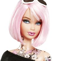 The First Tattooed Barbie Ever. I would totally buy this for my step daughter!