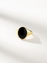 There’s nothing more stunning than this gold and Black Onyx Oval Ring. This statement ring will quickly become one of your everyday favorites. For a look we know Kristin loves, pair this black and gold ring with our Around Town Ring. | Black Onyx and Gold Oval Ring in Size 7 | Women's Jewelry by Uncommon James