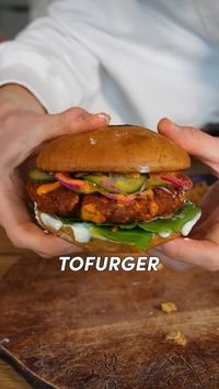 Maya / plant-based food and recipes on Instagram: "VEGANUARY 23/25 🌱 
25 recipes in 25min: TOFURGER 🍔 

EVERYONE will love tofu after having this burger… pinky promise! 😌
RECIPE (2 servings, 25min preparation time):
Quickles:
-1/2 cucumber
-1 red onion
Cut into thin slices.
-150ml water
-4 tbsp white wine vinegar
-2 tbsp sugar
-a pinch of salt
Bring to the boil briefly and pour over the veggies and set aside.
Patty:
-200g firm tofu, crumbled
-2 tbsp tomato paste
-1 tbsp soy sauce
-50g dried tomatoes, chopped
-a good pinch of salt
-1 teaspoon each of paprika and cumin
-1/2 tsp garlic powder
-5 tbsp (chickpea) flour
Mix well and shape into 2 large patties.
Fry in oil until golden brown.
Sauce:
-100g unsweetened vegan yogurt
-2 tsp tahini
-Juice of half a lime
-1/2 tsp garlic powder
-a pin