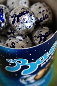 Baci- Perugina Chocolate Kisses with whole hazelnut inside. They have love fortunes as well. The classic, first love.