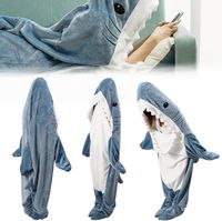 Cartoon Blanket Shark Sleeping Bag Pajamas Office Nap Karakal Soft Cozy High Quality Fabric Mermaid Shawl Blanket Children Adult Features: 1. Uniquely styled Shark pajamas and realistic prints wrap around your legs and feet, allowing you to get into character every time you put them on. 2. Made of the softest flannelette fabric, soft to lightweight and comfortable, warm and durable, let you warm through every cold night. 3. There are four sizes to choose from, S size for 125cm-135cm, M size for 135cm-155cm, L size for 155cm-175cm, XL size for 175cm-185cm, if you are over your normal weight, please choose a size larger 4. As a cool gift, Shark pajamas are the perfect choice for shark lovers. Make your friend or family member one of the coolest people around and let them enjoy tenderness and