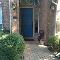 Our front door - new color and hardware. I love it. Color is Sherwin-Williams Georgian Bay