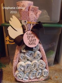 Made from a baby towel and diapers are inside, a cute Stork Bundle...for new expecting moms??