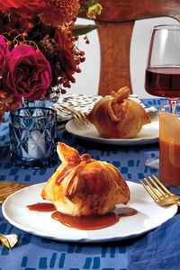 For a Hannukah dessert, core little McIntosh apples, sprinkle them with sugar and spice, and wrap them in pastry. While they’re turning puffed and golden, you’ll make a caramel sauce out of Manischewitz.