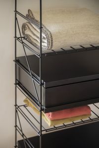 TRIA's latest upgrade includes new silent-stop closing mechanisms to soften the opening and closing of the drawers and modules. Combine them with our elegant black structure finish for a unique piece of furniture. #tria114 #triashelvingsystem #mobles114 #shelving #shelf #shelvingsystem #triamobles114 #massanatremoleda #furnituredesign #interiordesign #organizedhome #organizedliving #dreaminterior #getorganized #storage #storagesolutions #storagetips