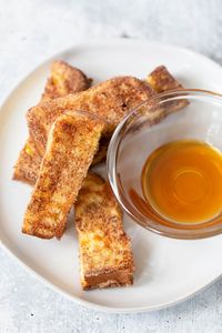 Air Fryer Cinnamon Sugar French Toast Sticks are crispy, delicious, and perfectly cook up in the air fryer! They are almost like churros or cinnamon sugar donuts. They are quick and easy to make.