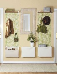 Small shelves on either side of mirror, hooks for hanging and box style storage underneath