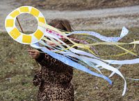 Paper Plate Kite. Tie to string instead of dowel for safety while running.