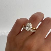 Elevate your love story with our stunning 2.50 CT Oval Cut Moissanite Engagement Ring Set, featuring a beautiful vintage hidden halo and a matching round marquise cut band crafted in luxurious 14kt gold. This exquisite Moissanite Engagement Ring Set radiates brilliance and timeless elegance, making it the perfect promise gift for your forever partner--make this symbol of your love a cherished centerpiece in their life today! ✥ Main Stone Details ✥ ↣ Shape: Oval Cut Moissanite Diamond ↣ Weight: 2