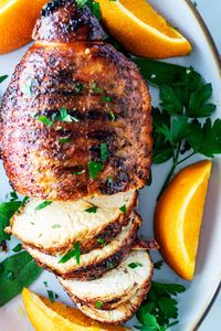 Looking for an easy holiday main course perfect for a small group? You will love this Ninja Foodi Grill Turkey Breast. With just a handful of ingredients and minimal hands-on time, you have a boneless turkey breast that is crispy on the outside and juicy on the inside.