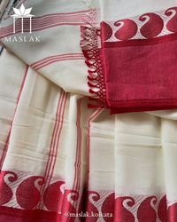 Our Red Border White Saree, perfect for your Pujo Looks. Soft Cotton Sarees 🌸 these sarees combine comfort and grace with traditional craftsmanship. Discover the essence of #SoftCottonSarees, and #TimelessElegance. Elevate your wardrobe with our exquisite collection! Price: Rs 1900/- (free shipping) 🤍 For booking: DM us on @maslak.kolkata or WhatsApp 6291508485 with a screenshot. Note: Unboxing video is a must for product exchange or return.#IndianFashion #TraditionalWear #SareeLove #Handl...