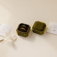 Keep your prized possessions safe and sound in this velvet ring box. The 2 slot ring holder is both perfect for practical usage as well as for looking elegant anytime and anywhere. Made of soft velvet in a variety of colors Dimensions: 2x2 Inches, 1.75 Inches tall Our Ring Case is compact enough to fit in your luggage wherever you go while still keeping your jewelry in place. SKU: RR-XR010 Sizing Guide Rings are created true to standard US sizing. For the best fit we suggest having your finger(s