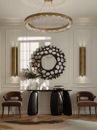 You may keep your modern, neutral entryway design intriguing by combining different textures or adding minor gold elements. Impress your guests with this incredibly magnificent entryway, which has the hand-painted Ardara II Console as the focal point. This fantastic item is perfect for enhancing the mood in any home design.

