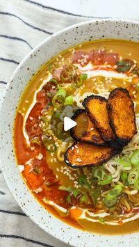 BOSH! by Henry & Ian on Instagram: "🥕🌱 Carrot and Coriander Noodle Soup 🍜🔥  🚨Save the video and follow for more recipes 🙏🏻 
For the Soup: 2 tbsp vegetable oil, 1 bunch spring onions, 3 garlic cloves, 2-inch piece of ginger, 6 large carrots, 1 red chilli, 1.5L vegetable stock, 1 x 400ml tin coconut milk, 1 tbsp soy sauce, 1 tsp rice vinegar, 2 tsp ground coriander, 1 tsp turmeric, 1.5 tbsp white miso paste, 4 portions ramen noodles.
 For the Caramelised Carrots: 2 large carrots, 2 tsp ground coriander, 1 tsp ground turmeric, 1 tbsp vegetable oil, Salt & pepper.
 For the Garnish: Coconut milk, 1 tbsp chilli oil, Sesame seeds, Coriander leaves.
 How to Make It: 1️⃣ Caramelise the Carrots: Toss the thinly sliced carrots in oil, coriander, turmeric, and seasoning. Bake until crispy and g