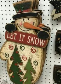 Snowman wood craft. Snowman in a mitten.