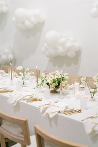 cloud-shaped white balloon installation decor for a chic + airy cloud-inspired bridal shower