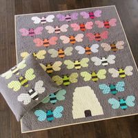 These busy patchwork bees and their hive are made using conventional piecing techniques. Pre-cut friendly with no templates or paper piecing!