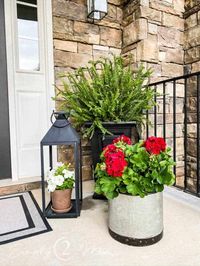 Do you want to update your front porch? Look no further...I've got some simple and affordable updates for your summer front porch refresh. #frontporch #porch #summer #bench #flowerpots #blackdoor #frontdoor #smallporch