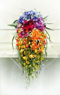 Rainbow Wedding Bouquet - I love this too and am interested in the waterfall...I love that the touches of white make it feel bridal even though its so unique